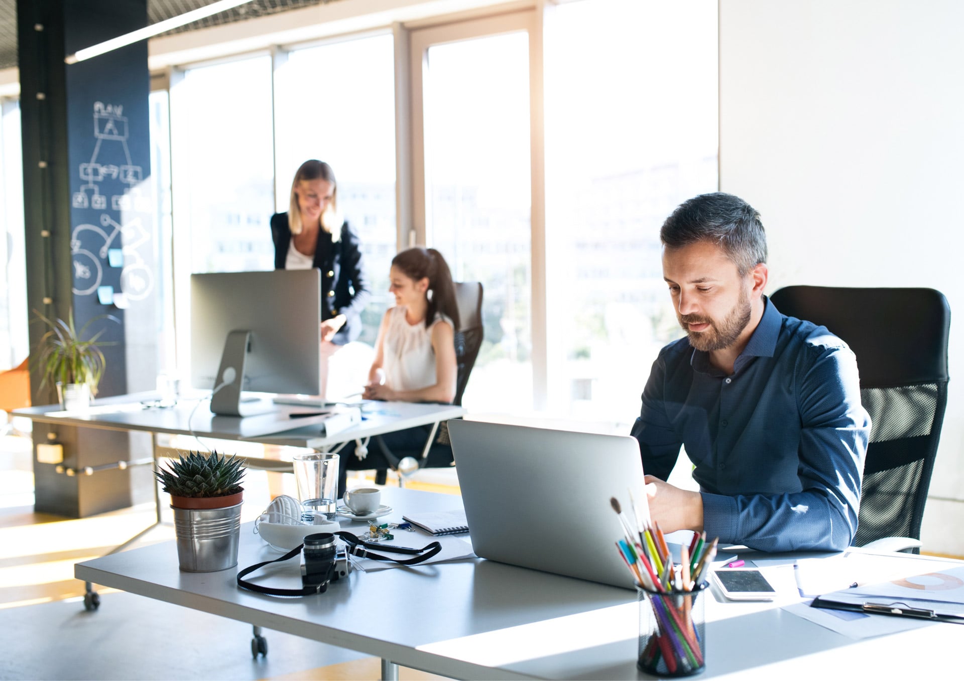 Employees using spend management software
