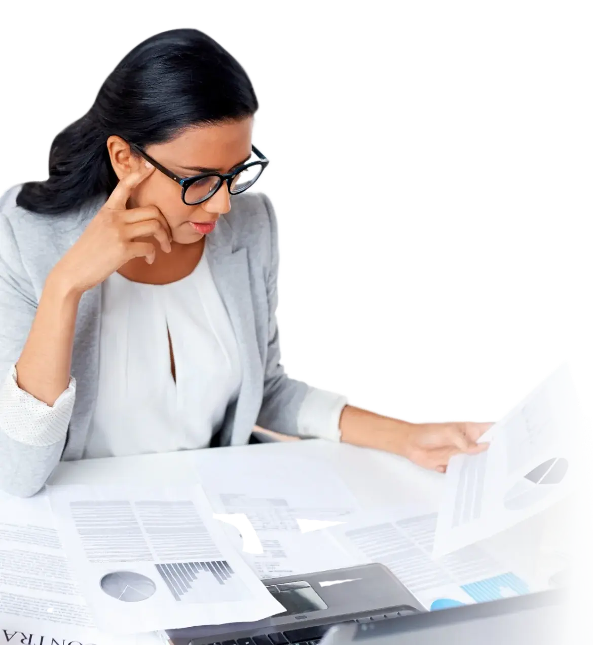 Finance lead working through a stack of paper invoices